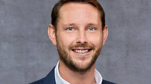 Reto Gauch lächelt in die Kamera (Foto: DQ Solutions) Porträt von Reto Gauch, Mitarbeiter DQ Solutions