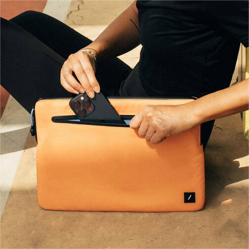 Native-Union-Stow-Ultra-Sleeve-MB-Pro-16-2-M4-Pro-2024-Apricot-05.jpg