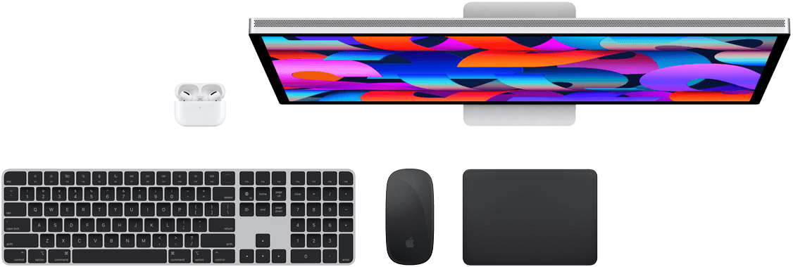 Draufsicht auf Air Pods, ein Studio Display, ein Magic Keyboard, eine Magic Mouse und ein Magic Track Pad